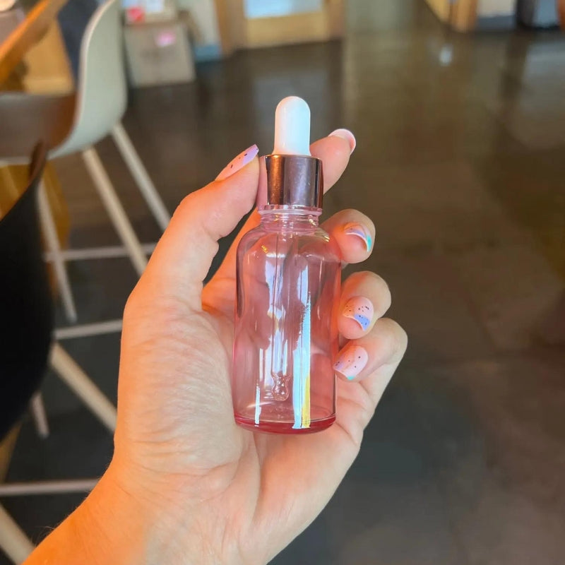 Flacon avec pipette pour voyage