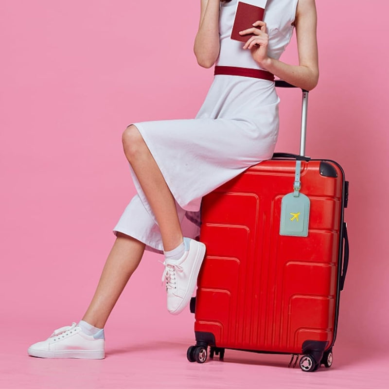 Porte-étiquette valise fabriqué en simili